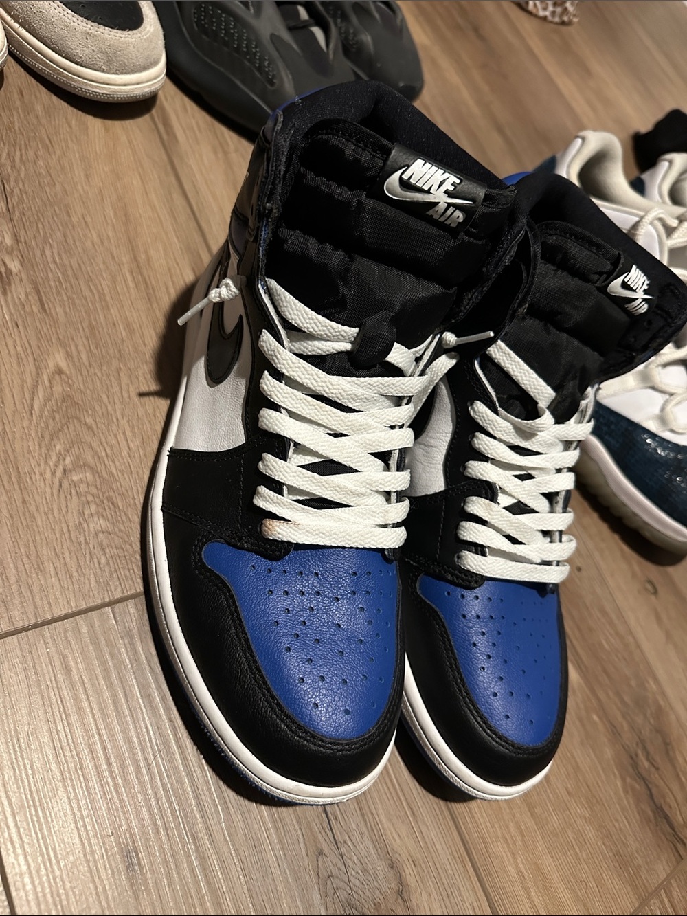 Jordan 1 Nike Air High-Top Sneakers in Black, White & Blue